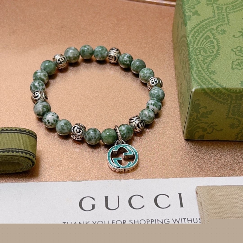 G*u*i bracelets
